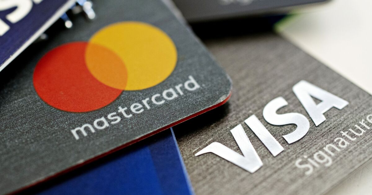 Visa, Mastercard to delay merchant fee hikes another year - NewsOpener Visa, Mastercard to delay merchant fee hikes another year