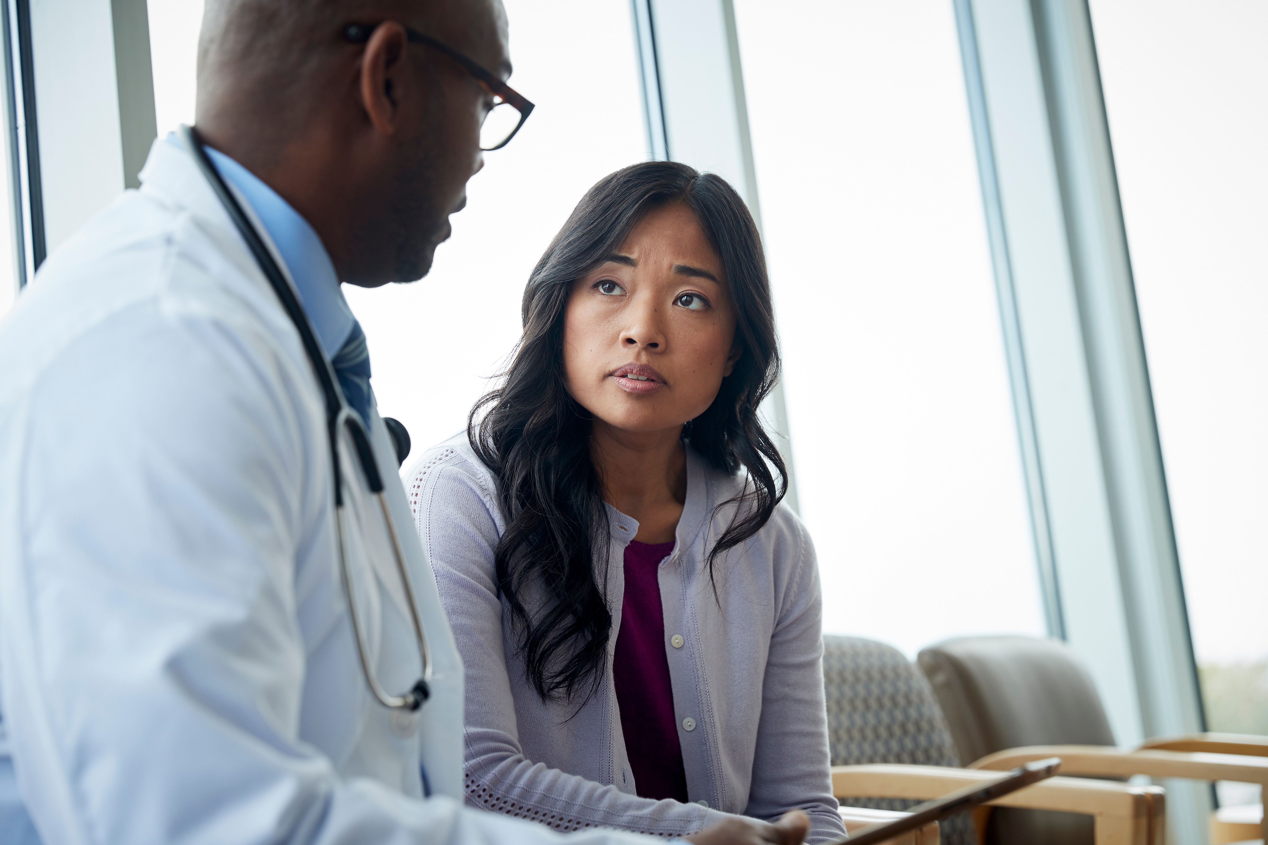 Can increasing women's access to specialists decrease insurance costs?