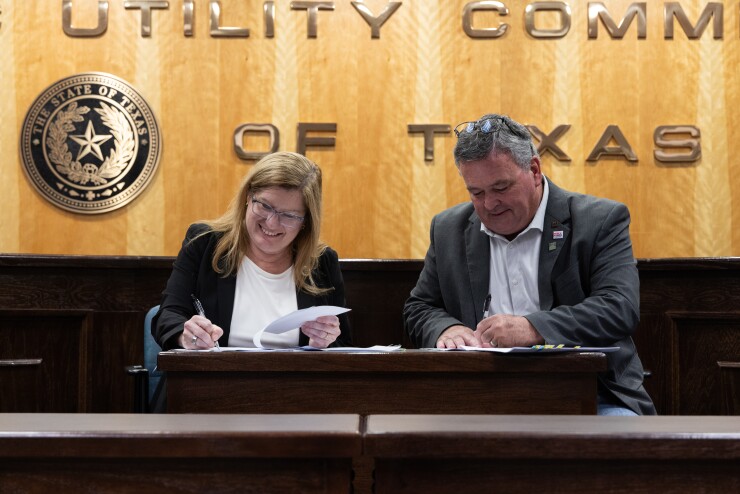 Texas Energy Fund loan signing