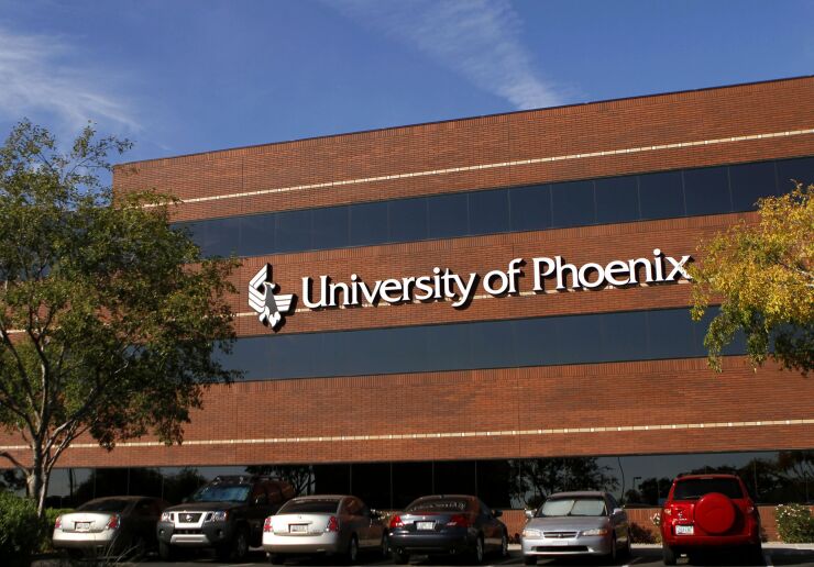 University of Phoenix sign on a brick building