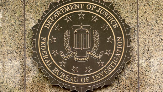 Washington, DC - June 02, 2018: FBI, Federal Bureau of Investigation seal on the Headquarters Edgar Hoover FBI Buildingin in Washington.