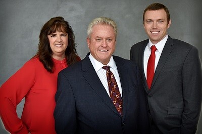 Advisors James Trimpe and Timothy Stolt join Raymond James from Wells Fargo. Left to right: Lori Rupe, James Trimpe, Timothy Stolt