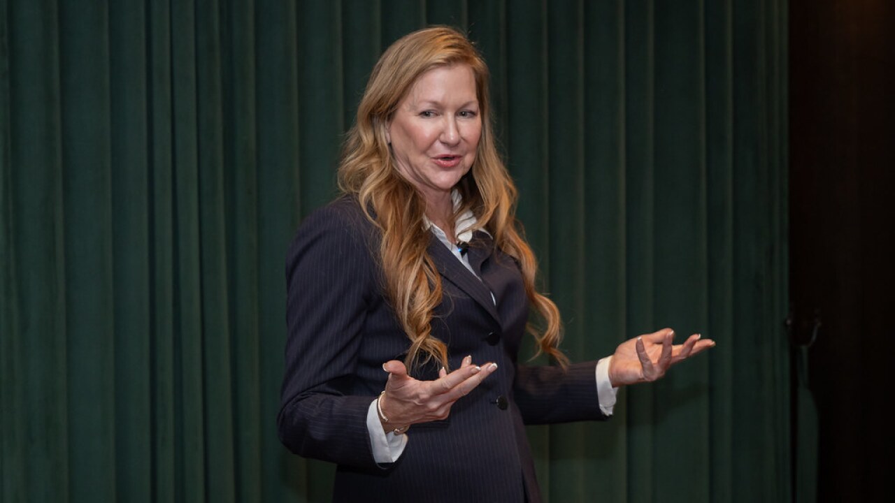 Stacy Warren speaking at the WIL luncheon.