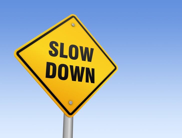 slow-down-sign-adobe