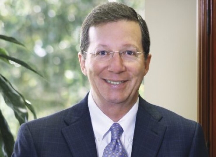 Seacoast CEO Dennis Hudson prioritizes one-on-one meetings with top talent and roundtable gathering with branch managers as part of a management training initiative.