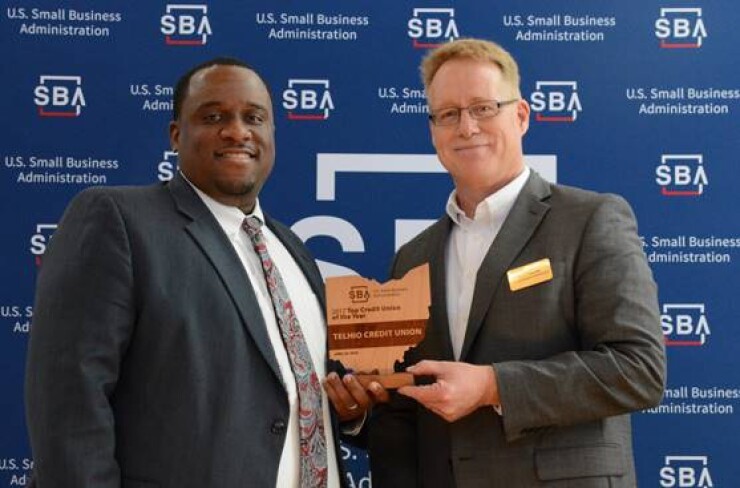 Derrick Bailey, chief sales officer, Telhio Credit Union and Scot Hardin, district director for the U.S. Small Business Administration, Columbus District Office. The credit union was recognized by the SBA in June 2018.