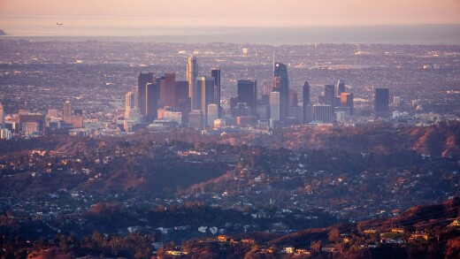A layer of smoke blankets downtown Los Angeles