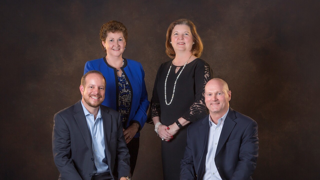 On a hot recruiting streak, Stifel picked up a new team for a branch in McAllen, Texas that opened in January. From left to right: Jonathan Montgomery, Sharon Cavazos, Teresa Hunter, and Jerry Raders.