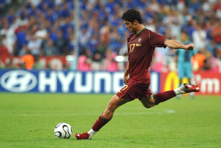 Cristiano Ronaldo of Portugal takes a free kick during the 2006 FIFA World Cup in Munich, Germany.