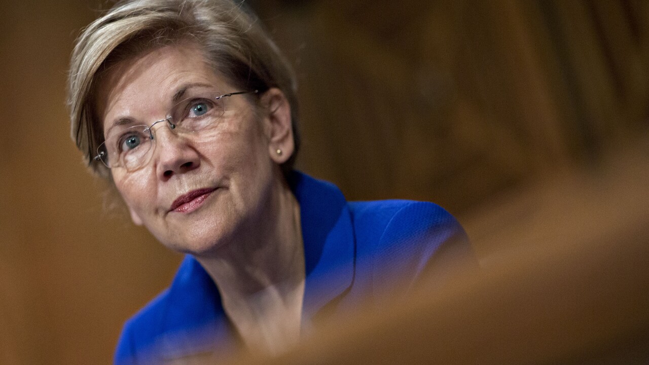 Sen. Elizabeth Warren, D-Mass., listens during a Senate Banking Committee hearing in Washington on the Equifax cybersecurity breach.