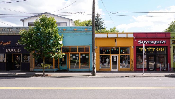 Small businesses stand temporarily closed in Portland, Oregon, on June 17.