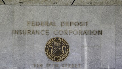 Washington D.C., USA - March 1, 2020: Sign and seal of The Federal Deposit Insurance Corporation (FDIC), an federal agency insuring deposits in U.S. banks and thrifts in the event of bank failures.