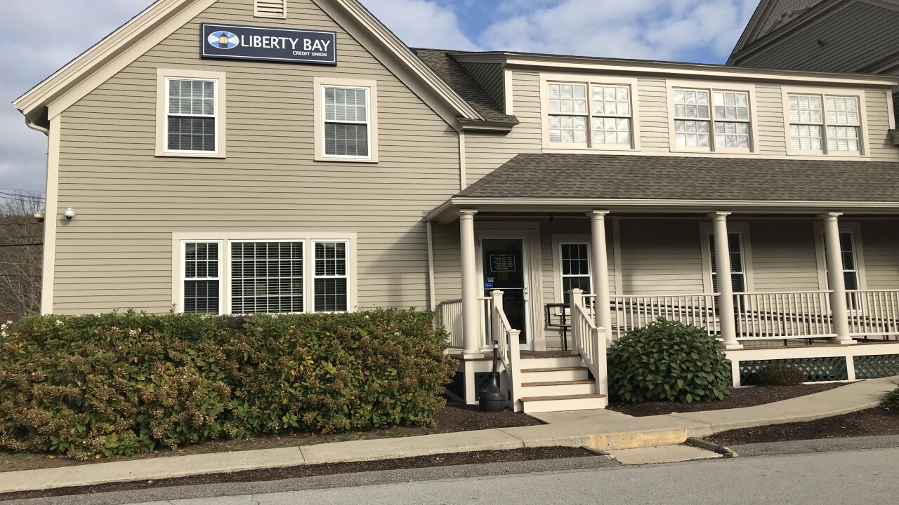 The former Hingham Federal Credit Union office in Hingham, Mass., shows off its new Liberty Bay Credit Union signage.