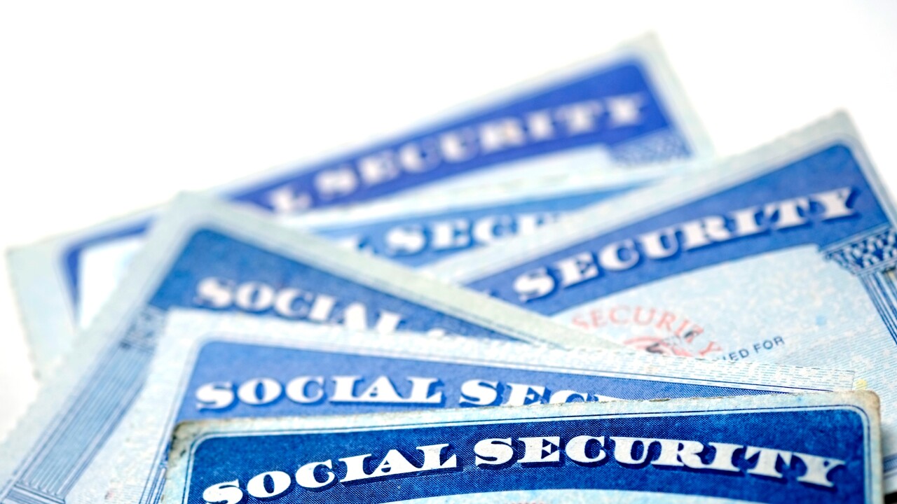Social Security Cards in a Row Pile for Retirement