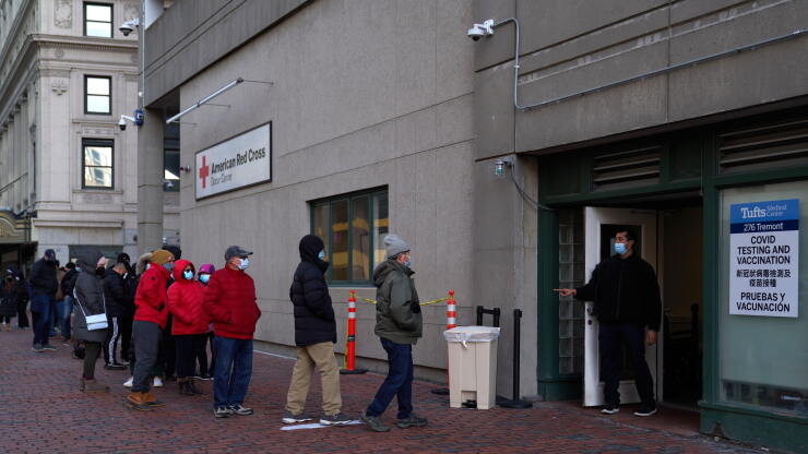 Line up for COVID tests and vaccinations at Tufts Medical Center