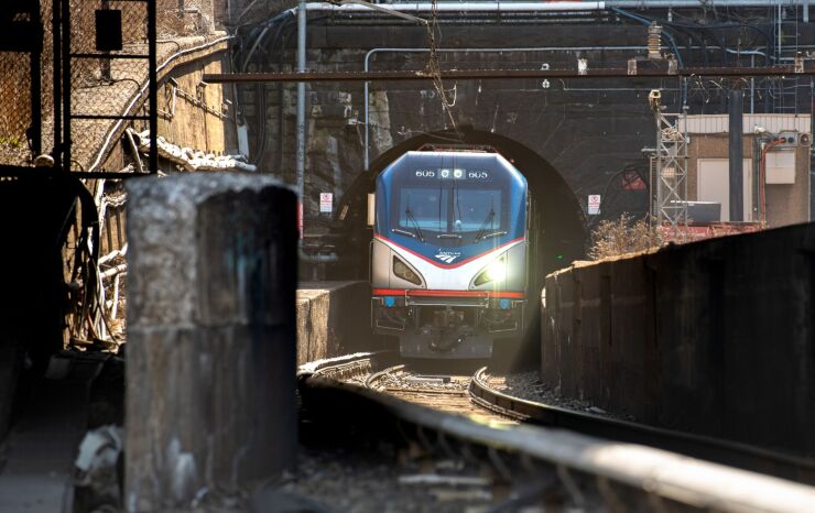 An Amtrak train exits the North River Tunnel in North Bergen, New Jersey, on March 13, 2019.