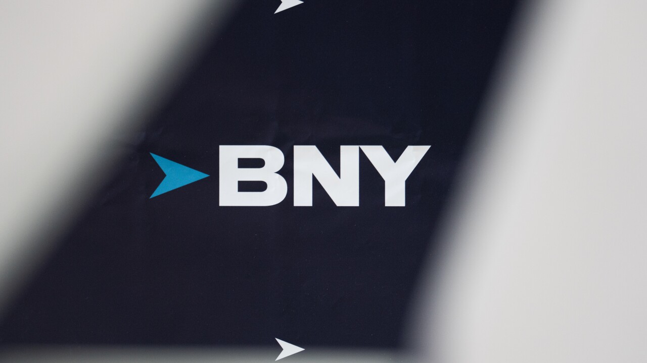A Bloomberg News image displays the corporate logo of BNY at the company's headquarters.