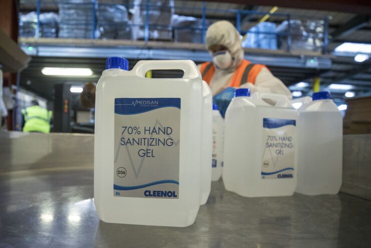 Five litre bottles of 70% hand sanitizing gels sit on the production line at Cleenol Group Ltd.'s factory in Banbury, U.K., on Friday, March 6, 2020. The stockpiling crisis that has hit supermarkets across Asia has spread to Europe as consumers start hoarding groceries and hygiene products amid fears of a coronavirus pandemic. Photographer: Chris Ratcliffe/Bloomberg