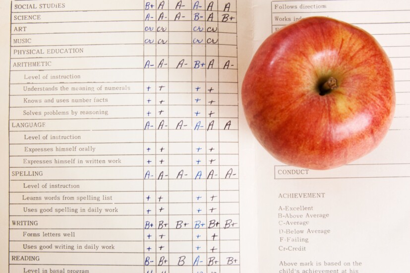 Apple on a vintage report card