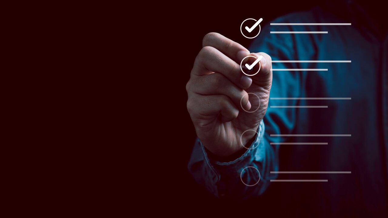 Person checking off boxes