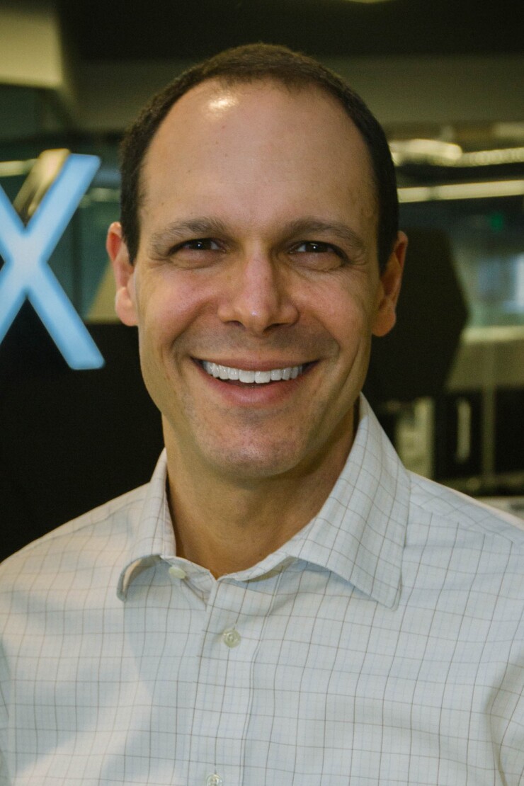 Ben Holzman, chief operating officer at MX