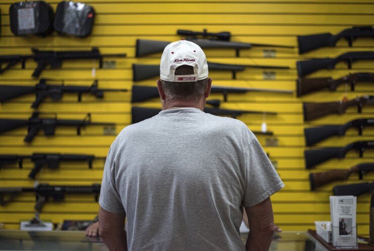 A customer at a gun shop in Albuquerque, New Mexico.