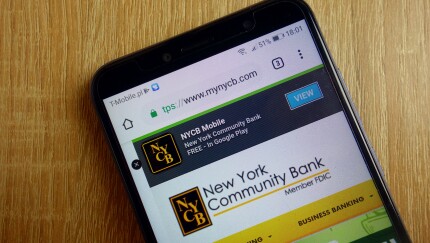 New York Community Bank website (www.mynycb.com) displayed on smartphone