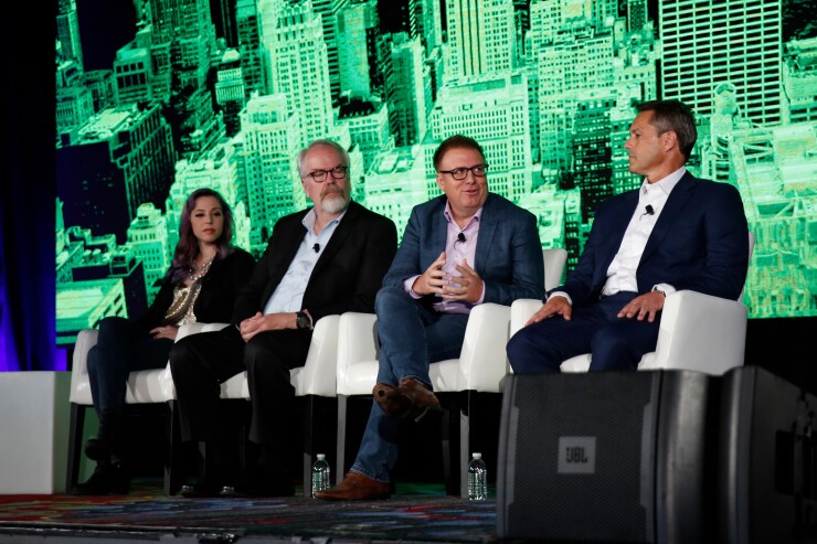 From left: Amber Baldet, co-founder and CEO of Clovyr; Vern Brownell, CEO of D-Wave; Aaron Spradlin, co-Founder & CEO of cleverDome; and Salvatore Cucchiara, head of wealth management technology at Morgan Stanley.