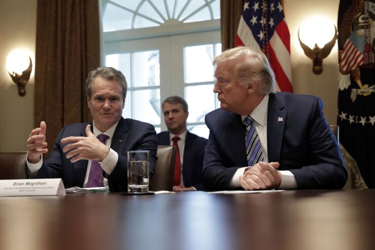 BofA CEO Brian Moynihan, seen here speaking with President Trump at the start of the pandemic, said more government stimulus is needed to help struggling households and businesses.