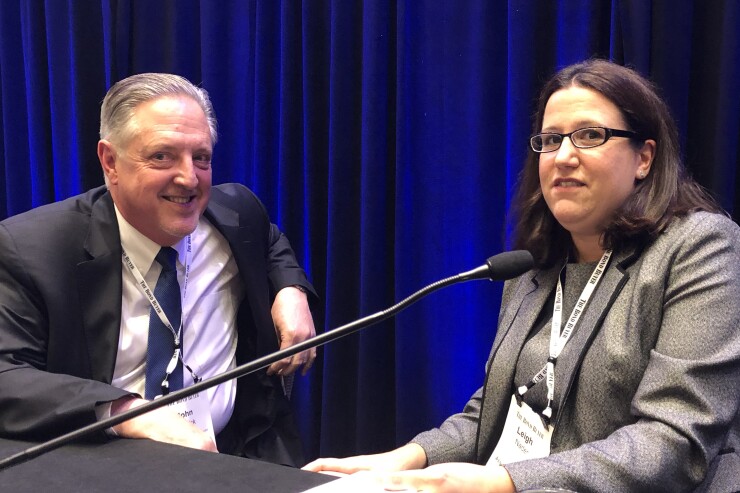 John Naglick, Chief Deputy CFO/Finance Director at City of Detroit, with Assured Guaranty Managing Director Leigh Nader at The Bond Buyer's Midwest Municipal Market Conference on June 21, 2018.