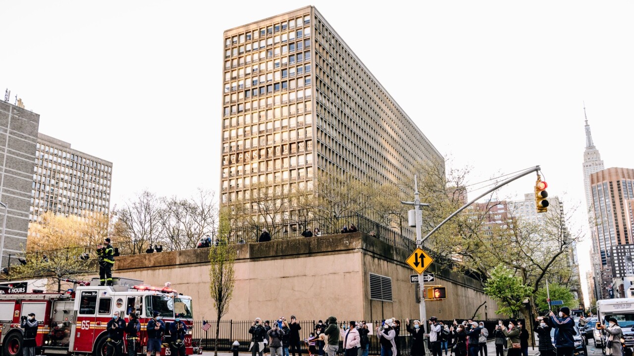Members of the New York Fire Department gather outside New York University Langone Health hospital in Manhattan to applaud the medical staff and essential workers during the pandemic in 2020.