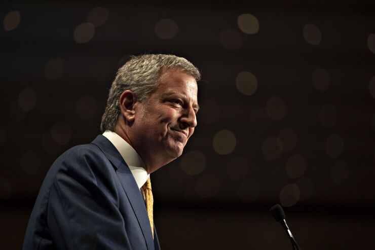 Bill de Blasio, mayor of New York City and then 2020 presidential candidate, smiles during an Iowa Democratic Party Hall of Fame event in Cedar Rapids, Iowa, U.S., on Sunday, June 9, 2019.