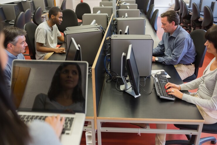 Online website marketing - people at computers