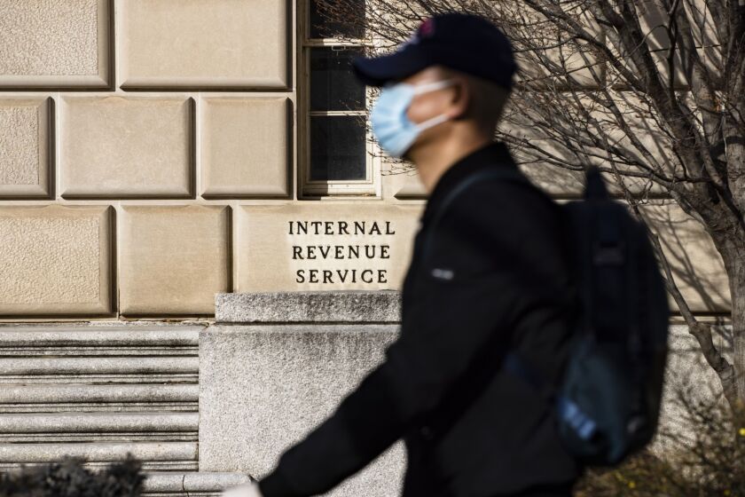 irs-building-masked-passerby.jpg