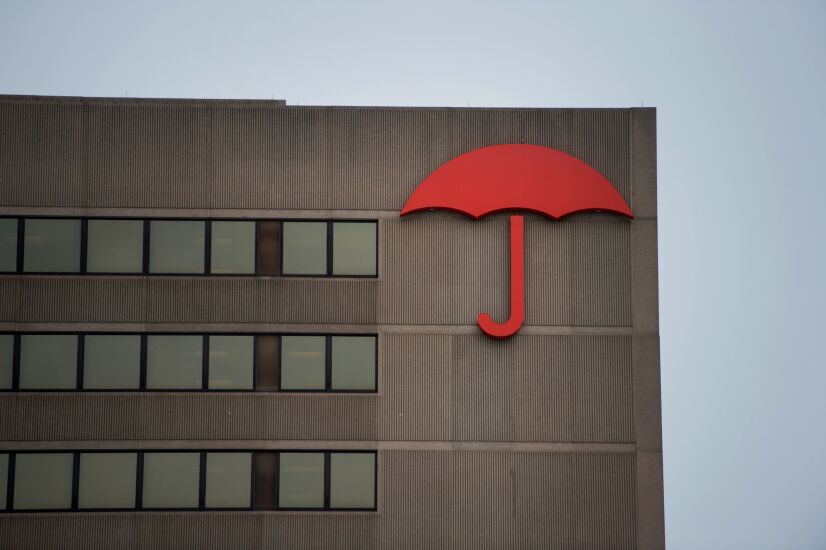 The Travelers Insurance Co. logo is displayed on the company's office building in Hartford, Connecticut, U.S., on Friday, Feb. 6, 2015. Obamacare's startup health insurance plans are flirting with financial distress, as all but five of the 23 nonprofit companies had negative cash flow from operations in the first three quarters of 2014, Standard & Poor's said in a report Tuesday. Photographer: Ron Antonelli/Bloomberg