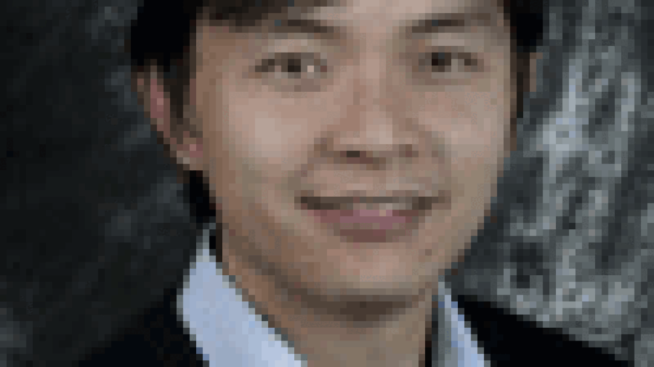 kam100x133.gif