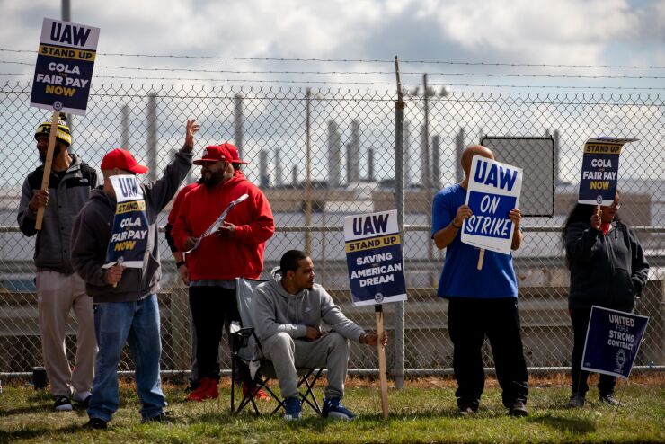 Striking members of the United Auto Workers union picket