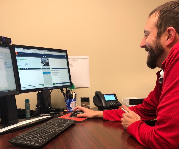 A Southwest Financial Federal Credit Union representative uses the CU's video chat system for members.