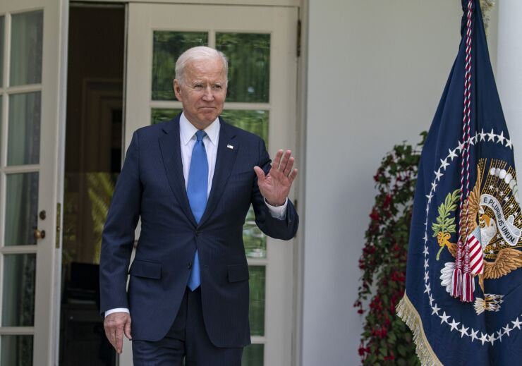 President Joe Biden waving