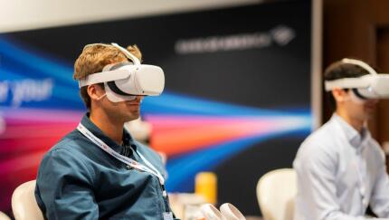 New employees at Bank of America wear VR headsets
