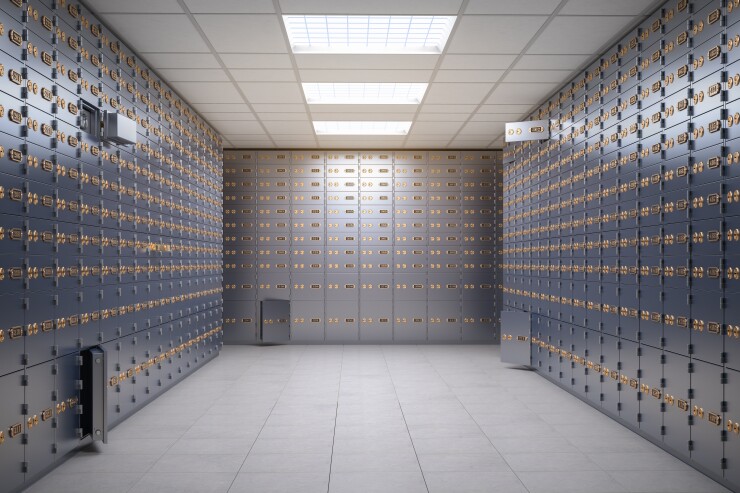 Safety deposit boxes inside a bank vault