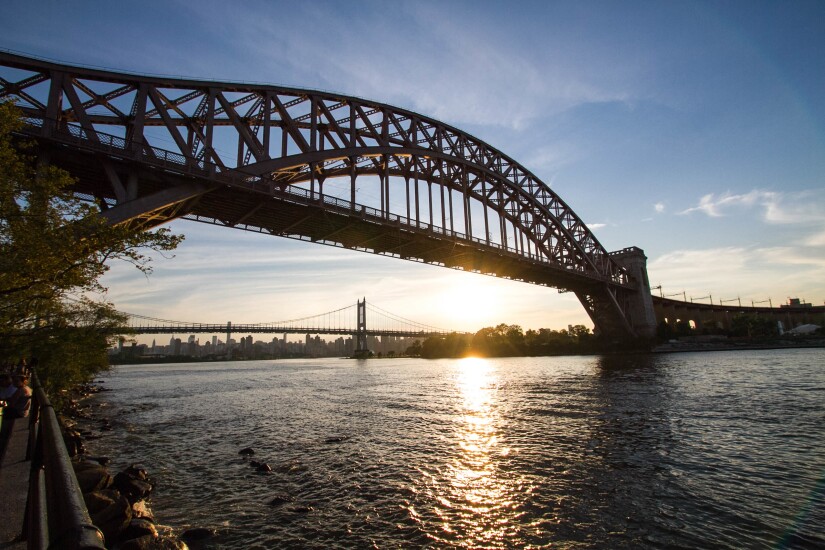 Hell Gate Bridge in New York City, which carries Amtrak trains from Boston and New Haven to Penn Station.