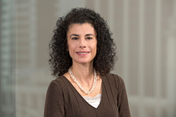 Fitch Senior Director Marcy Block.