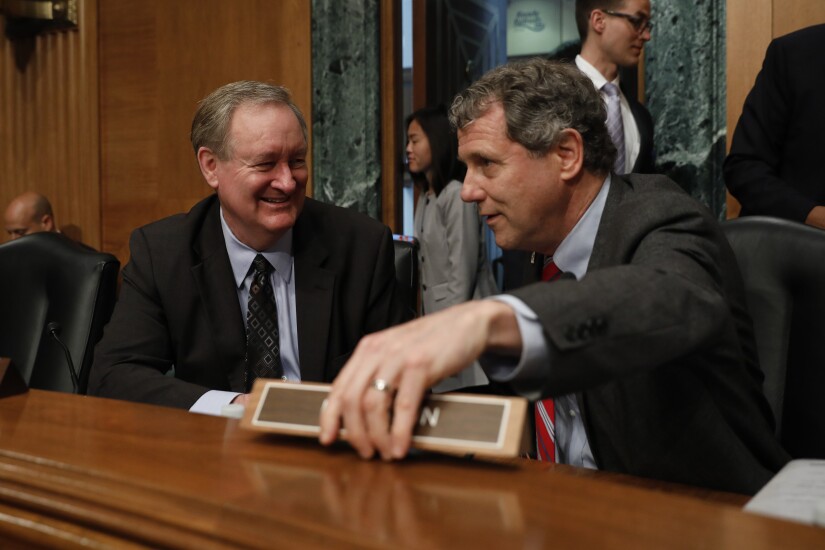 crapo-mike-brown-sherrod-bl-070318.jpg