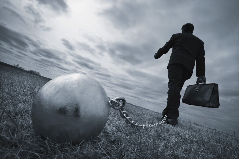 bizman-ball-and-chain-23966013-adobe.jpeg