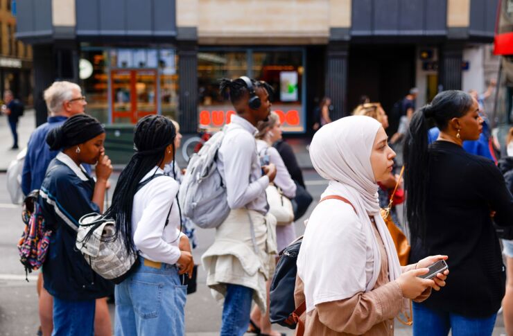 Commuters queue for buses outside London Liverpool Street railway station during a one-day strike by tube workers in London, UK, on Friday, Aug. 19, 2022. London's subway network largely ground to a halt on Friday as workers went on strike, bringing more disruption to Britain’s embattled transport system.