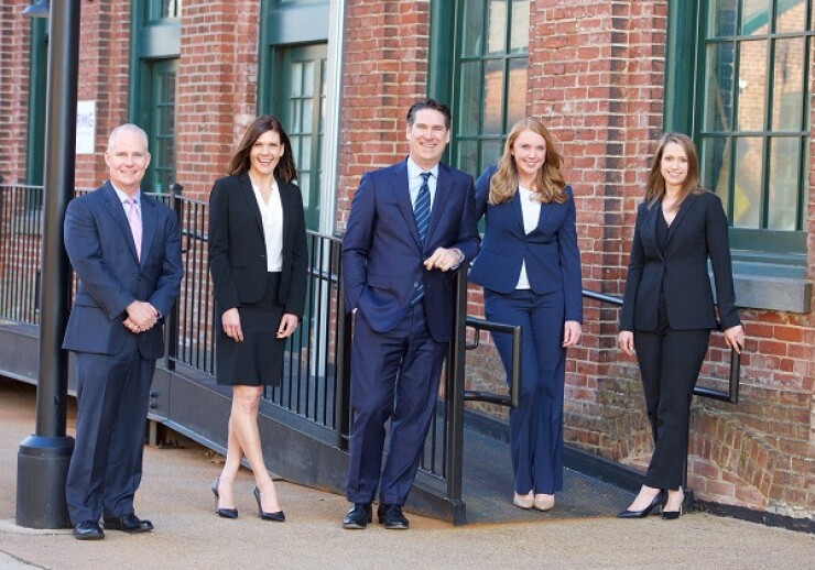 A photo of the team at Seyle Hickey Wealth Management. From left: Tim Hickey, Kristin DeLong, Rusty Seyle, Alison Ehret, Marisa Gurnari. Photo courtesy Raymond James.