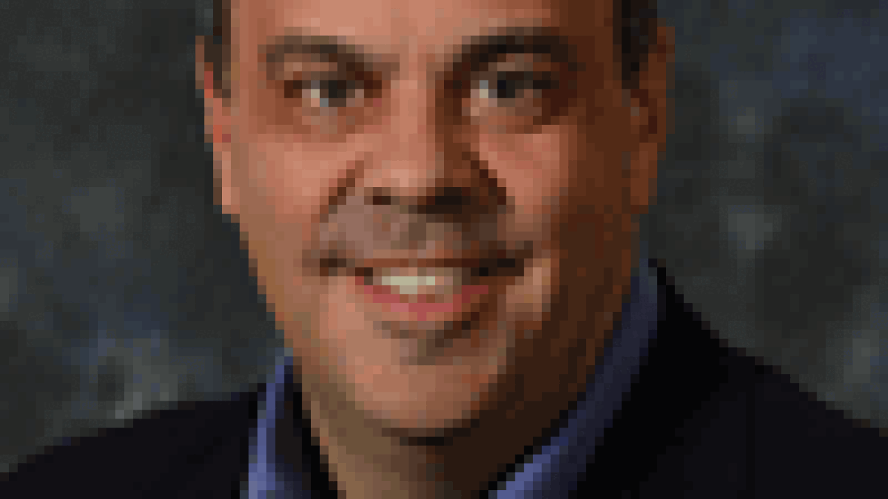 ambach-dennis100x133.gif