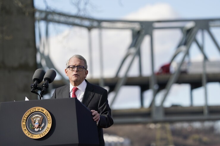 Ohio Gov. Mike DeWine speaks at a podium