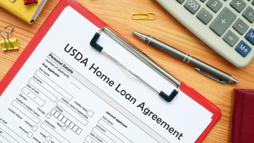 Business concept meaning USDA Home Loan Agreement with inscription on the business paper